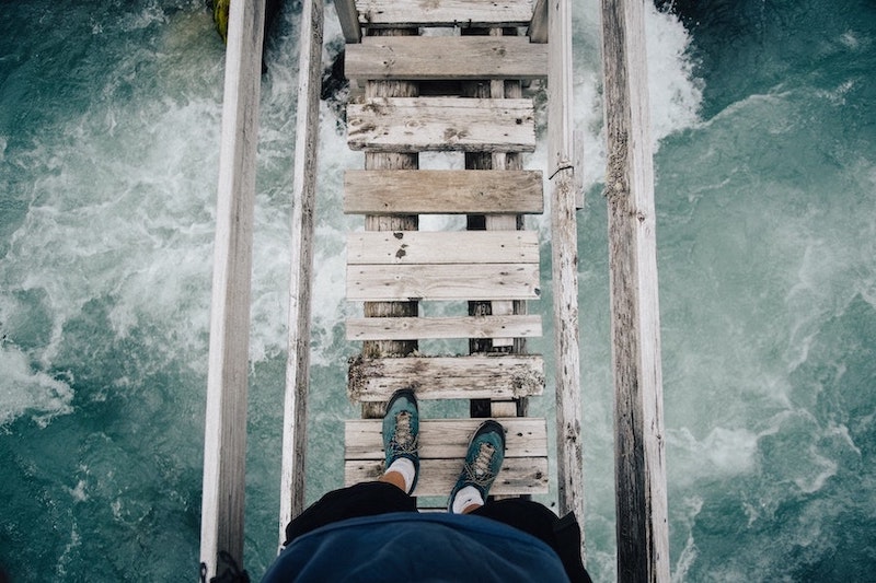 Being Fearless in Crossing a Rickety Bridge Over Water